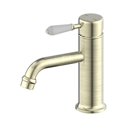 York Straight Basin Mixer With White Porcelain Lever Aged Brass